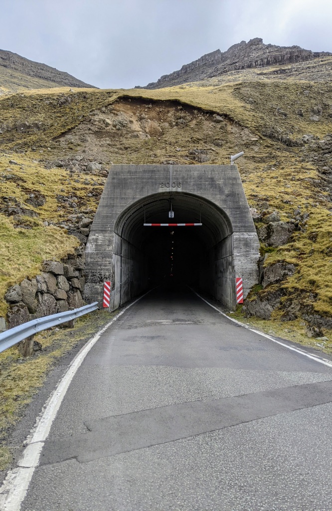 A tunnel carved into a cliff in the Faroe Islands