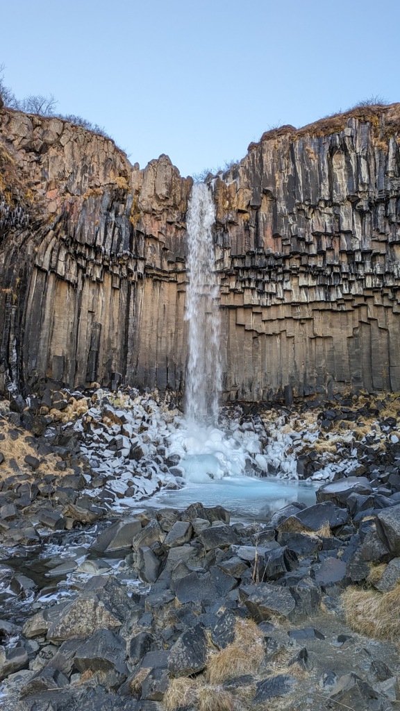 Svartifoss waterfall surrounded by basalt columns in Skaftafell Nature Preserve in southern Iceland